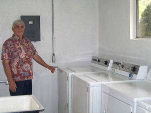 Leisure World Resident Clarence Fuqua in the laundry room
